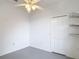 Neutral bedroom with a closet offering space for storage and ceiling fan at 1332 Osceola Hollow Rd, Odessa, FL 33556