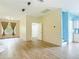 Modern kitchen with white cabinets, blue countertops, and a center island at 1332 Osceola Hollow Rd, Odessa, FL 33556