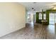 Bright and airy living space with wood-look floors, and an open layout at 1332 Osceola Hollow Rd, Odessa, FL 33556