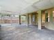 Spacious screened-in patio provides outdoor living and views of the surrounding property at 1332 Osceola Hollow Rd, Odessa, FL 33556