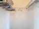 Walk-in closet with shelving and hanging racks at 1332 Osceola Hollow Rd, Odessa, FL 33556