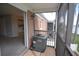 Screened-in porch with AC unit and view of a kitchen and waterfront at 13758 Orange Sunset Dr # 202, Tampa, FL 33618