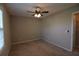 Bedroom with neutral walls, carpet, ceiling fan with lights, and doorway to another room at 13758 Orange Sunset Dr # 202, Tampa, FL 33618