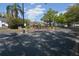Gated community entrance with secure access control and well-maintained landscaping at 13758 Orange Sunset Dr # 202, Tampa, FL 33618