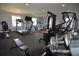 Spacious community gym showcasing a variety of weight-training equipment and exercise machines at 13758 Orange Sunset Dr # 202, Tampa, FL 33618