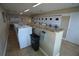 Bright community laundry room with clean machines, folding space, and convenient amenities at 13758 Orange Sunset Dr # 202, Tampa, FL 33618