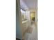 Updated bathroom with neutral vanity, black and white floors, and updated lighting at 1408 Millstream Ln # 206, Dunedin, FL 34698