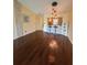 Hardwood floors unite the living room and kitchen for seamless entertaining in this modern home at 1408 Millstream Ln # 206, Dunedin, FL 34698