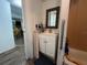 Bathroom with mirror and sink and shower/tub combo at 14210 Downing St, Dover, FL 33527