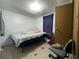 Bedroom with bed and chair at 14210 Downing St, Dover, FL 33527