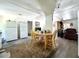 Dining area featuring a wooden table and chairs next to the kitchen at 14210 Downing St, Dover, FL 33527
