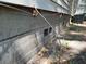 Close-up of the house foundation with ventilation at 14210 Downing St, Dover, FL 33527