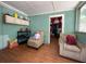 Cozy living room features a traditional decor and hardwood floors at 14210 Downing St, Dover, FL 33527