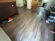 New wood floor, kitchen and living space in the background at 14210 Downing St, Dover, FL 33527