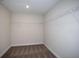 Spacious walk-in closet with carpet flooring and white wire shelving for optimal storage and organization at 14411 Meadow Bird Ave, Riverview, FL 33579