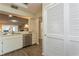 Spacious, well-lit kitchen showcasing stainless steel appliances and an open design, perfect for entertaining guests at 1535 Nursery Rd # 110, Clearwater, FL 33756