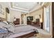 Bright main bedroom featuring a view of the outdoor patio, stylish furniture, and ample natural light at 16248 Ivy Lake Dr, Odessa, FL 33556