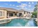 Enjoy the beautiful backyard featuring a sparkling pool and spa with a view at 16248 Ivy Lake Dr, Odessa, FL 33556