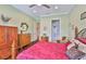 Comfortable bedroom with an en-suite bathroom and ample natural light at 1723 Pacific Dunes Dr, Sun City Center, FL 33573