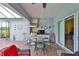 Entertainer's dream: covered patio features a built-in outdoor kitchen with seating for outdoor fun at 1723 Pacific Dunes Dr, Sun City Center, FL 33573