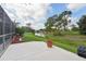 Scenic backyard with a patio, beautiful landscaping, and a water view at 18712 Forest Glen Ct, Tampa, FL 33647