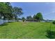 Extensive backyard with a screen enclosed pool providing privacy and space for relaxation at 1899 Oak Park S Dr, Clearwater, FL 33764