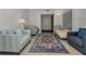 Bright living room with stylish furnishings and a colorful area rug at 1899 Oak Park S Dr, Clearwater, FL 33764