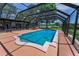 Escape to this backyard pool offering a refreshing escape, surrounded by a spacious deck and lush landscaping at 1899 Oak Park S Dr, Clearwater, FL 33764