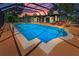 A large screened-in pool offers ample space for swimming and lounging at 1899 Oak Park S Dr, Clearwater, FL 33764