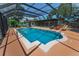 Bask in the sun by the pool featuring a spacious pool deck with outdoor seating and a relaxing atmosphere at 1899 Oak Park S Dr, Clearwater, FL 33764