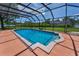 Dive into this refreshing screened-in pool, perfect for relaxation and recreation with a spacious pool deck and clear blue water at 1899 Oak Park S Dr, Clearwater, FL 33764