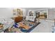 Bright living room boasting white marble floors, neutral furniture, and decorative accents for a welcoming space at 208 Live Oak Ln, Largo, FL 33770