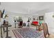 Versatile living room with lots of light, room for a home office and relaxation at 208 Live Oak Ln, Largo, FL 33770