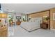 A bright main bedroom featuring tile floors and large windows at 208 Live Oak Ln, Largo, FL 33770