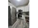 Updated kitchen features stainless steel appliances and stylish countertops at 21352 Lehouier Dr, Brooksville, FL 34601