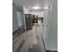 Bright kitchen featuring modern stainless-steel appliances and clean white cabinets at 21352 Lehouier Dr, Brooksville, FL 34601