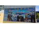Detailed mural depicting Tampa's rich history with intricate artwork and informative text at 2328 W La Salle St, Tampa, FL 33607