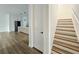 Open-concept space featuring stairs, and a kitchen island with modern pendant lighting at 2328 W La Salle St, Tampa, FL 33607