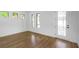 Bright living room with recessed lighting, wood floors, lots of natural light and a glass-paneled door at 2328 W La Salle St, Tampa, FL 33607