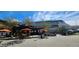 Charming outdoor restaurant with shaded seating areas and stunning cruise ship views at 2328 W La Salle St, Tampa, FL 33607
