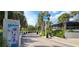 Scenic Tampa Riverwalk featuring lush landscaping, signage, and waterfront dining options at 2328 W La Salle St, Tampa, FL 33607