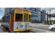 Vintage-style streetcar with vibrant colors and signage, providing public transportation in the city at 2328 W La Salle St, Tampa, FL 33607