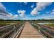 Scenic boardwalk stretches over a serene lake at 2459 Parkstream Ave, Clearwater, FL 33759