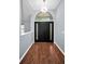 Foyer featuring a wooden floor and a front door at 2459 Parkstream Ave, Clearwater, FL 33759