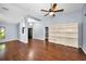 Expansive living room with hardwood floors and an open layout perfect for entertaining and relaxing at 2459 Parkstream Ave, Clearwater, FL 33759