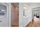 Updated bathroom with new flooring, vanity, and a tiled walk-in shower at 2518 Dick Wilson Dr, Sarasota, FL 34240