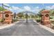 Ornate iron gates welcome you to the Villas at Edenfield community at 27427 Mistflower Dr, Wesley Chapel, FL 33544