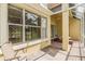 Relaxing outdoor brick-paved lanai with comfortable lounge chairs and view of the water at 27427 Mistflower Dr, Wesley Chapel, FL 33544