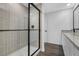 Stylish bathroom featuring a walk-in shower, granite countertops, and contemporary design at 29613 Fedora Cir, Brooksville, FL 34602