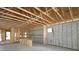 Interior view of new construction highlighting wooden framing, concrete block walls, window openings, and overall layout at 3110 19Th N St, St Petersburg, FL 33713